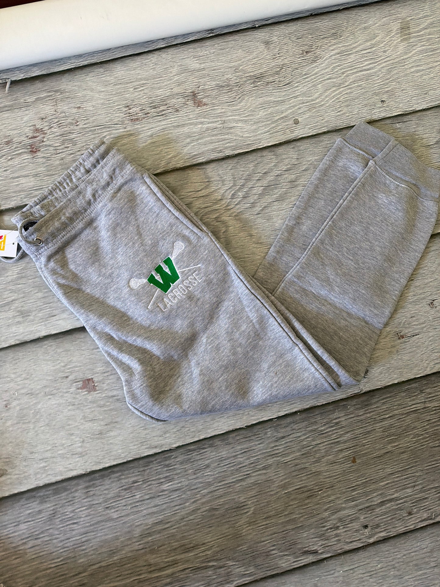 Adult medium gray joggers embroidered lacrosse logo NOT SCHOOL APPROVED