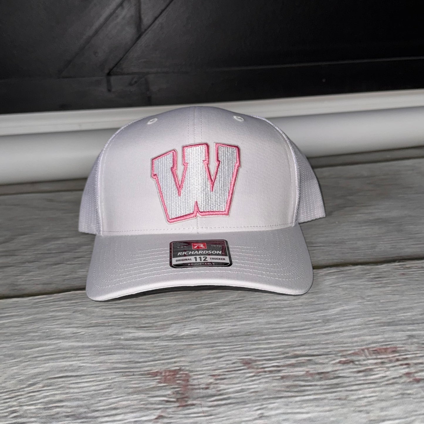 Pink out white and pink Weddington structured Trucker hat  embroidered W patch